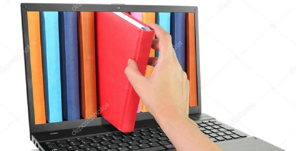 depositphotos_26937549-stock-photo-laptop-computer-with-colored-books