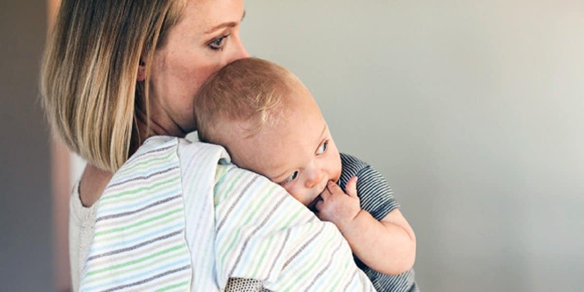 web3-mother-mom-child-baby-holding-cuddle-stocksy