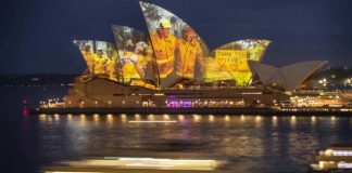 As icônicas velas da Ópera de Sydney acenderam com imagens dos incêndios florestais