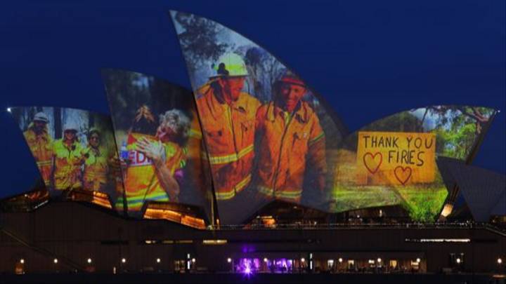 agrandeartedeserfeliz.com - As icônicas velas da Ópera de Sydney acenderam com imagens dos incêndios florestais