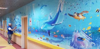 Artista transforma paredes de hospital em obra de arte para confortar doentes durante pandemia