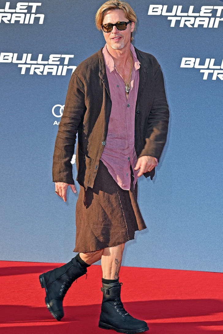 agrandeartedeserfeliz.com - Brad Pitt surpreendeu ao chegar à estreia de saia e camisa rosa